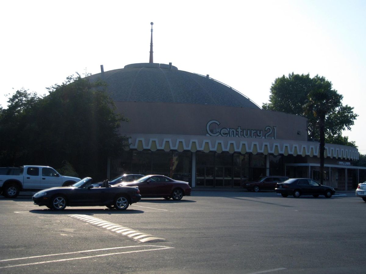 The Century 21 dome seen across its parking lot
