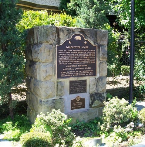 The California Historical Landmark plaque for the Winchester House, set in a stone